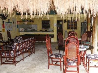 Another angle of the communal area looking into large kitchen. Profile Photos of Amigos Hostel Cozumel Calle 7 Sur # 571 x Ave 25 & 30 col. centro - Photo 6 of 7 Another angle of the communal area looking into large kitchen. Profile Photos of Amigos Hostel Cozumel Calle 7 Sur # 571 x Ave 25 & 30 col. centro - Photo 6 of 7