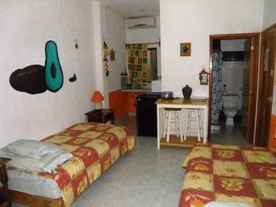 Private Avocado room 3 single beds, kitchenette, bathroom Profile Photos of Amigos Hostel Cozumel Calle 7 Sur # 571 x Ave 25 & 30 col. centro - Photo 7 of 7 Private Avocado room 3 single beds, kitchenette, bathroom Profile Photos of Amigos Hostel Cozumel Calle 7 Sur # 571 x Ave 25 & 30 col. centro - Photo 7 of 7