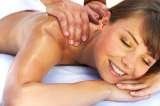A beautiful young woman getting a massage Massage Specialists Mobile Massage 