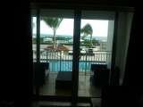 TERRACE POOL AND HOT TUB VIEW FROM INSIDE STUDIO UNIT. OPEN DOOR AND WALK 4 STEPS DOWN TO TERRACE. vacations 7 resorts international 107 turtle cove drive 