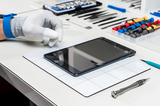 Technician replacing a used tablet, pod screen, The Woodlands Cell Phone Repair, The Woodlands
