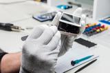 Technician replacing the screen of a used smartphone, The Woodlands Cell Phone Repair, The Woodlands