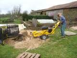 Stump grinder in action., David Cropper stump grinding and jungle busting services., TaizÃ© Aizie