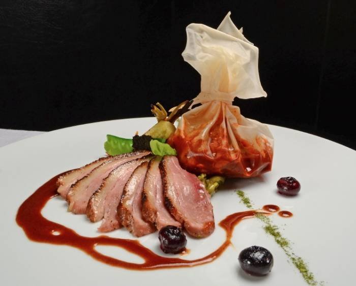 Duck Duo; Breast slices and Leg in Mixiote - Duo de pato mixiote Gourmet creations - Dishes of Cafe des Artistes Guadalupe Sanchez 740, Downtown nh - Photo 15 of 17 Duck Duo; Breast slices and Leg in Mixiote - Duo de pato mixiote Gourmet creations - Dishes of Cafe des Artistes Guadalupe Sanchez 740, Downtown nh - Photo 15 of 17