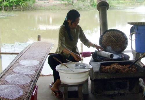 making rice-paper in Cuchi village CUCHI TUNNELS & CAO DAI TEMPLE of PD TOURISM & TRADING CO., LTD. 516 Nguyen Chi Thanh st., - Photo 6 of 6