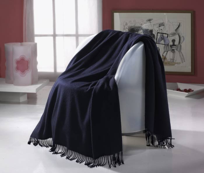 THROW PLAID CASHMERE BLEND SOFFIO<br />
Soffio, Joyful throw available in many colours, is woven in blended soft cashmere 25% and soft merino wool 75%. Made in Italy, in fact inÂ BIELLA THE AREA OF QUALITY On sale at: www.cashmerewool.us www.cashmere-wool.co.u cashmere throws and cushions of Cashmerewool Piazza XXV Aprile, 2/F - Photo 4 of 7