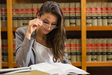 lawyer researching case in law library Law Office of Tawni Takagi 22148 Sherman Way #105 