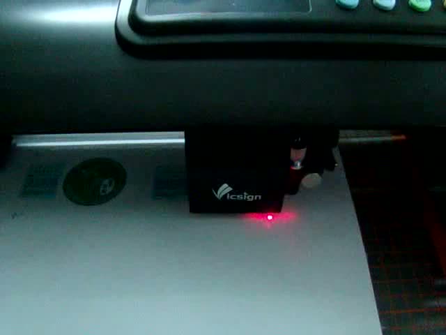Laser red dot contour cutting.MPG