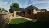 New bungalow west elevation and garden, Alpha Team Building Services, Chelmsford