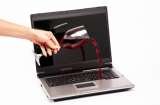 Red wine spilled on laptop keyboard on white background AJPC Solutions 4 Stuart Court 