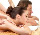 Young man and woman receiving shoulder massage, Lirio Therapy, Bromley