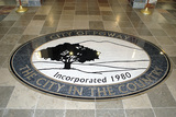 Waterjet cut natural stone on stainless steal. Honor Life 955 Park Center Drive 