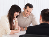Happy Young Couple Discussing With Consultant In Office
** Note: Shallow depth of field, Quick Short Term Loans Bad Credit, Columbus