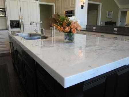 White Carrera Marble Counter and dark toned cabinetry is a mistake free combination in every kitchen no matter the size. Profile Photos of Granite Max 225 N. Arlington heights Rd. Suite #113 - Photo 3 of 5 White Carrera Marble Counter and dark toned cabinetry is a mistake free combination in every kitchen no matter the size. Profile Photos of Granite Max 225 N. Arlington heights Rd. Suite #113 - Photo 3 of 5
