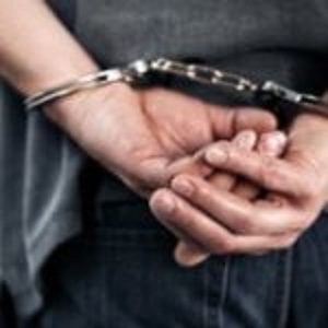 Arrested man in handcuffs with hands behind back Profile Photos of Hollingshead & Dudley DWI Lawyers 7777 Bonhomme Avenue, Suite 2401 - Photo 5 of 8