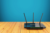 Wi-Fi wireless router on wooden table, Computer Cures, Elwood