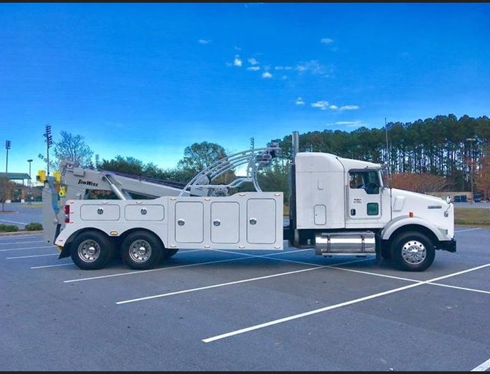  New Album of Norman Towing 133 24th Ave. NW PMB 150 - Photo 1 of 4