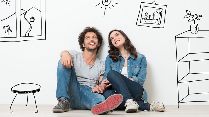 Portrait Of Happy Young Couple Sitting On Floor Looking Up While Dreaming Their New Home And Furnishing Profile Photos of iMortgageBroker Inc. - Dominion Lending Centres 415 Wharncliffe Rd S - Photo 7 of 7