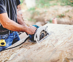 Industrial worker Using Circular Saw on wooden board in Carpentry Workshop Profile Photos of Eddowes & Woodland Ltd - Carpentry & Renovations 9 Southwood Court, Bigwood Road, Hampstead Garden Suburb - Photo 2 of 6 Industrial worker Using Circular Saw on wooden board in Carpentry Workshop Profile Photos of Eddowes & Woodland Ltd - Carpentry & Renovations 9 Southwood Court, Bigwood Road, Hampstead Garden Suburb - Photo 2 of 6