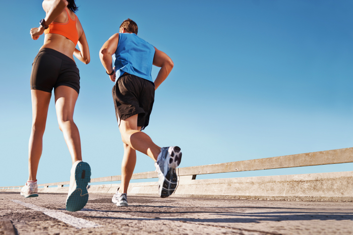 Man and woman running on a street with copyspace Bruening Foot & Ankle: Jeffrey Bruening, DPM of Bruening Foot & Ankle: Jeffrey Bruening, DPM 219 West Badillo, Suite A - Photo 2 of 4