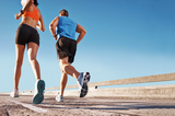 Man and woman running on a street with copyspace Bruening Foot & Ankle: Jeffrey Bruening, DPM 219 West Badillo, Suite A 