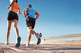 Man and woman running on a street with copyspace Midtown Foot Care 25 W 45th St #507 
