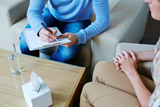 Male psychologist making notes during psychological therapy Carlyn Suriano 3808 W Riverside Dr Suite 505 