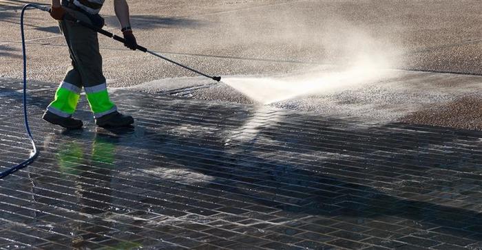  Wet cleaning of street with pressurized water. New Album of Clearflow Pressure Washing 6651 Abrego Rd. - Photo 4 of 4