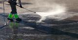  Wet cleaning of street with pressurized water., Clearflow Pressure Washing, Goleta