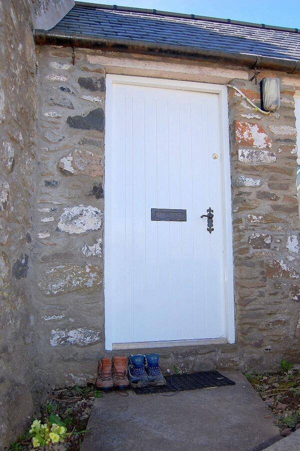 Auld Smiddy Cottage door after long walk. Profile Photos of East Muntloch Croft Bed & Breakfast and Auld Smiddy & Glen Auchie Holiday Cottages East Muntlloch Croft B & B, Cairngaan Road, - Photo 13 of 14