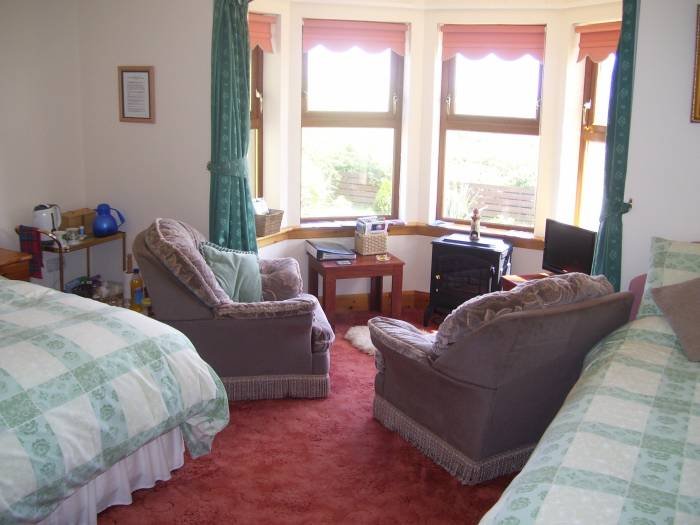 Front Ensuite Family Bedroom/Sittingroom New Album of East Muntloch Croft Bed & Breakfast and Auld Smiddy & Glen Auchie Holiday Cottages East Muntlloch Croft B & B, Cairngaan Road, - Photo 4 of 6
