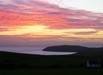 Sunrise over the Mull of Galloway from B & B front ensuite bedroom/sittingroom. New Album of East Muntloch Croft Bed & Breakfast and Auld Smiddy & Glen Auchie Holiday Cottages East Muntlloch Croft B & B, Cairngaan Road, - Photo 5 of 6 Sunrise over the Mull of Galloway from B & B front ensuite bedroom/sittingroom. New Album of East Muntloch Croft Bed & Breakfast and Auld Smiddy & Glen Auchie Holiday Cottages East Muntlloch Croft B & B, Cairngaan Road, - Photo 5 of 6