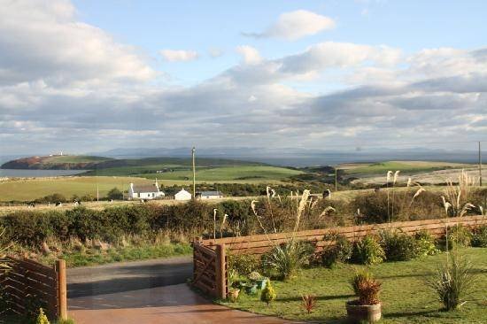 East Muntloch Croft B & B Garden and view to the Mull of Galloway and the sea. New Album of East Muntloch Croft Bed & Breakfast and Auld Smiddy & Glen Auchie Holiday Cottages East Muntlloch Croft B & B, Cairngaan Road, - Photo 6 of 6 East Muntloch Croft B & B Garden and view to the Mull of Galloway and the sea. New Album of East Muntloch Croft Bed & Breakfast and Auld Smiddy & Glen Auchie Holiday Cottages East Muntlloch Croft B & B, Cairngaan Road, - Photo 6 of 6