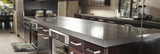 Dark wood kitchen island with open oven doors, Montiel Countertops LLC, Mount Rainier