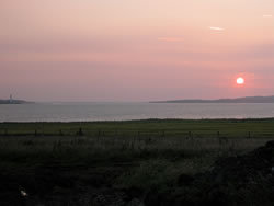 Sunset views from Buxa Croft House sleeping 8 in 2 doubles and 2 bunk bed of Buxa Farm Chalets & Croft House A964 - Photo 13 of 18