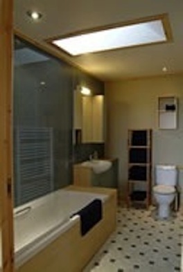 Roomy bathroom with shower over tub 3 chalets sleeping 4 each in king and/or twin beds of Buxa Farm Chalets & Croft House A964 - Photo 10 of 16