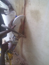   brick wall cutting work using single phase hitachi make CM12Y diamond circular blade saw cutting machine                                 TRITHERM Rcc Concrete Cutting Contractors agencies in Chennai india 13,Anjaneyar koil street,West  saidapet,chennai 