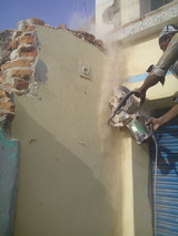 brick wall cutting work using single phase hitachi make CM12Y diamond circular blade saw cutting machine                               TRITHERM Rcc Concrete Cutting Contractors agencies in Chennai india 13,Anjaneyar koil street,West  saidapet,chennai 