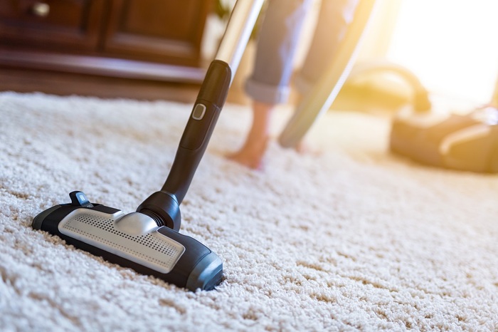 Young woman using a vacuum cleaner while cleaning carpet in the house. Profile Photos of Carpetland USA West Allis 1451 South 108th Street - Photo 1 of 6 Young woman using a vacuum cleaner while cleaning carpet in the house. Profile Photos of Carpetland USA West Allis 1451 South 108th Street - Photo 1 of 6