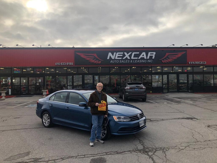 Another happy client with a beautiful blue 2017 Volkswagen Jetta! Happy Client Photo of Nexcar Auto Sales & Leasing 1235 Finch Ave West - Photo 3 of 77