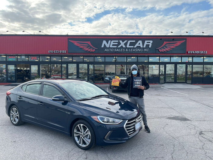 Happy owner of a used Hyundai Elantra! Happy Client Photo 2 of Nexcar Auto Sales & Leasing 1235 Finch Ave West - Photo 26 of 77