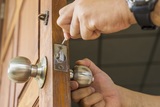 close-up locksmith repair silver lock on wood door - can use to display or montage on product, Discount Window and Door, Camp Verde