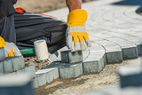 Brock Paving Closeup Photo. Construction Worker Paving Brick Pathway., Exterior Pavers Designs Inc., San Carlos